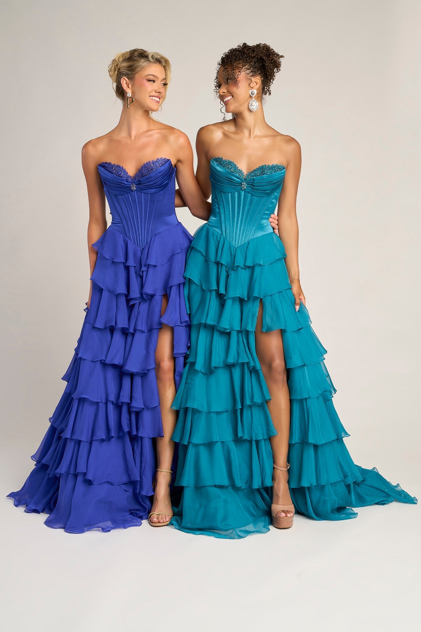 Royal Teal Ruffle Gown by PS25963, two women