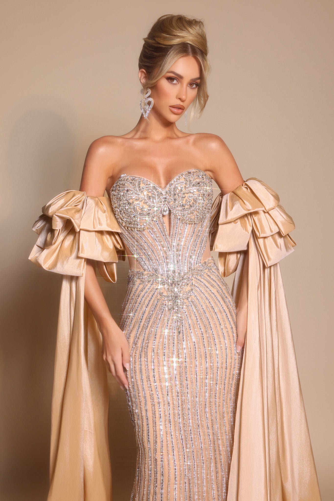 Champagne embellished gown with draped sleeves
