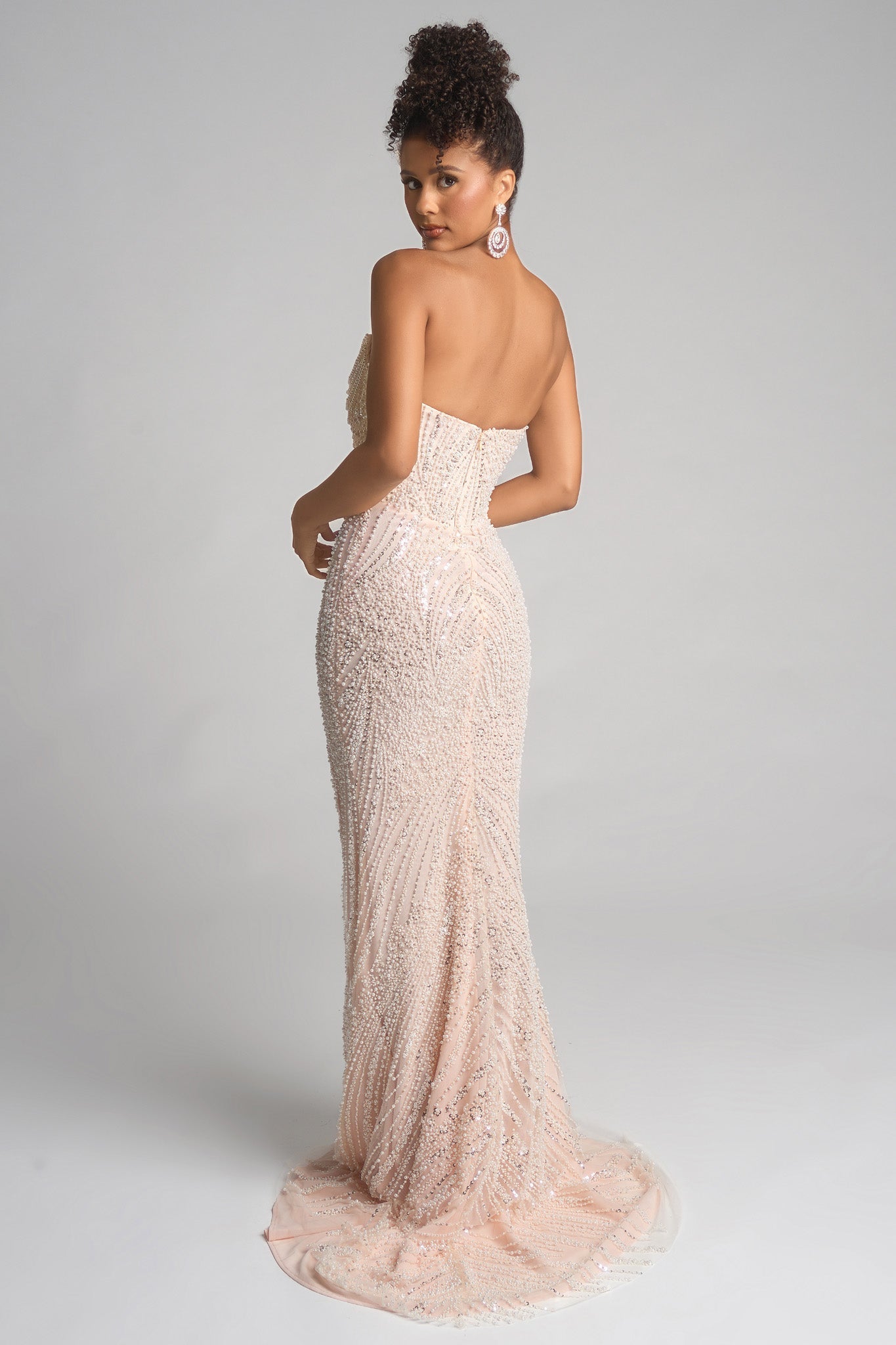 Champagne-colored gown PS26277 on model