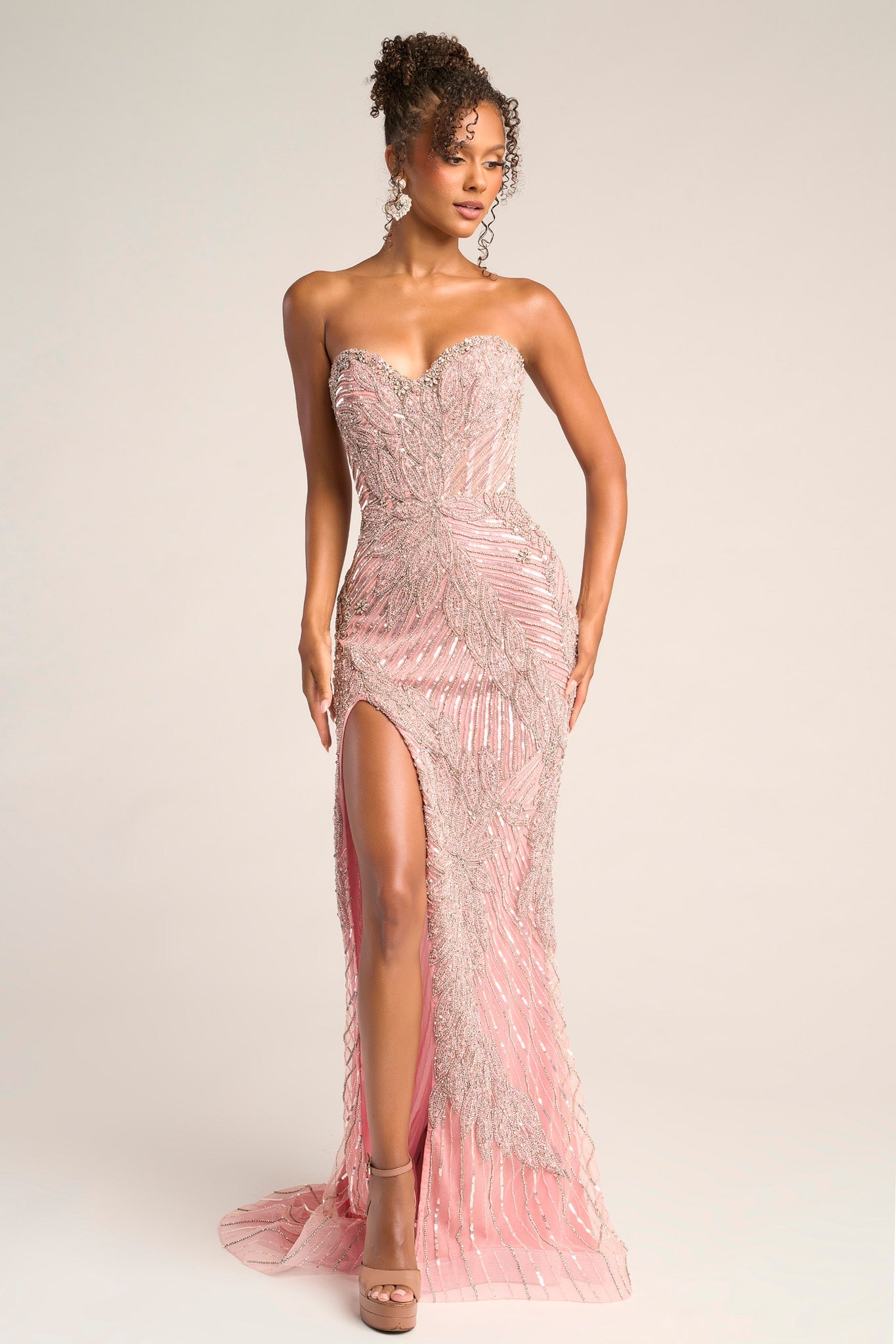 Pink & silver beaded strapless gown with high slit.