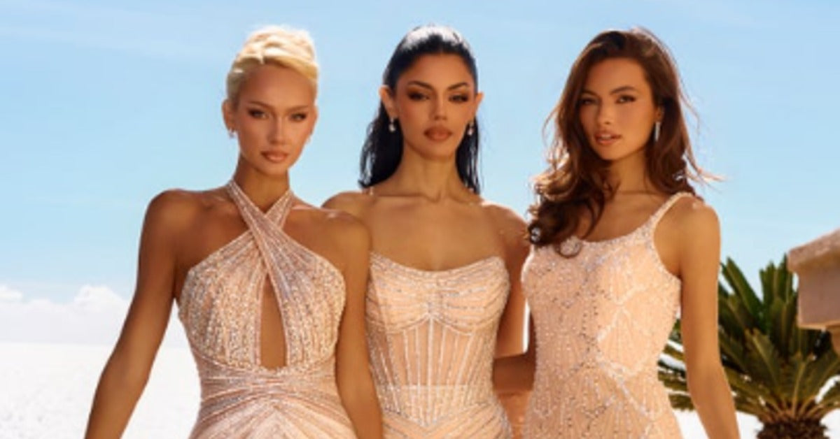 Three women pose outdoors in shimmering blush evening dresses, including a floor-length gown and two short styles.