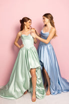 Two women in elegant dresses, KmzT8w7Q_050e460d-e99c-4540-a6d7-b722119ba5e6.