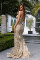 Woman in PS25190-Gold-03 sequin gown
