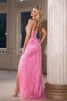 Pink formal gown on model