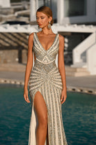 Beaded evening gown with high slit
