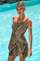 Black & gold beaded dress PS25818c on a woman by the pool
