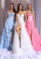 Three elegant ruffle gowns in light blue, ivory, and pink