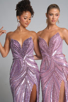 Two women in lilac and pink beaded formal gowns
