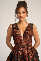 PS26312E Black Brown floral gown on a woman