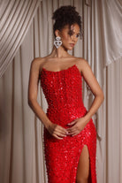 Red sequin strapless dress with high slit