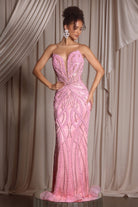 Pink tonal formal gown with intricate beading.