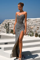 Silver beaded evening gown with high slit