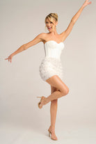 PS26500 White Dress - Woman in white mini dress posing