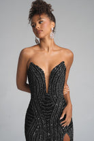 Woman in black beaded evening gown, Oct 29, 2025