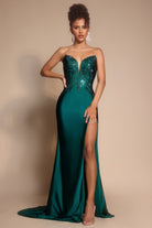 Emerald green formal gown with thigh slit.