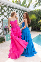 Pink and teal tiered formal dresses