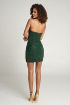 Woman in green beaded dress - sJN8bLsC